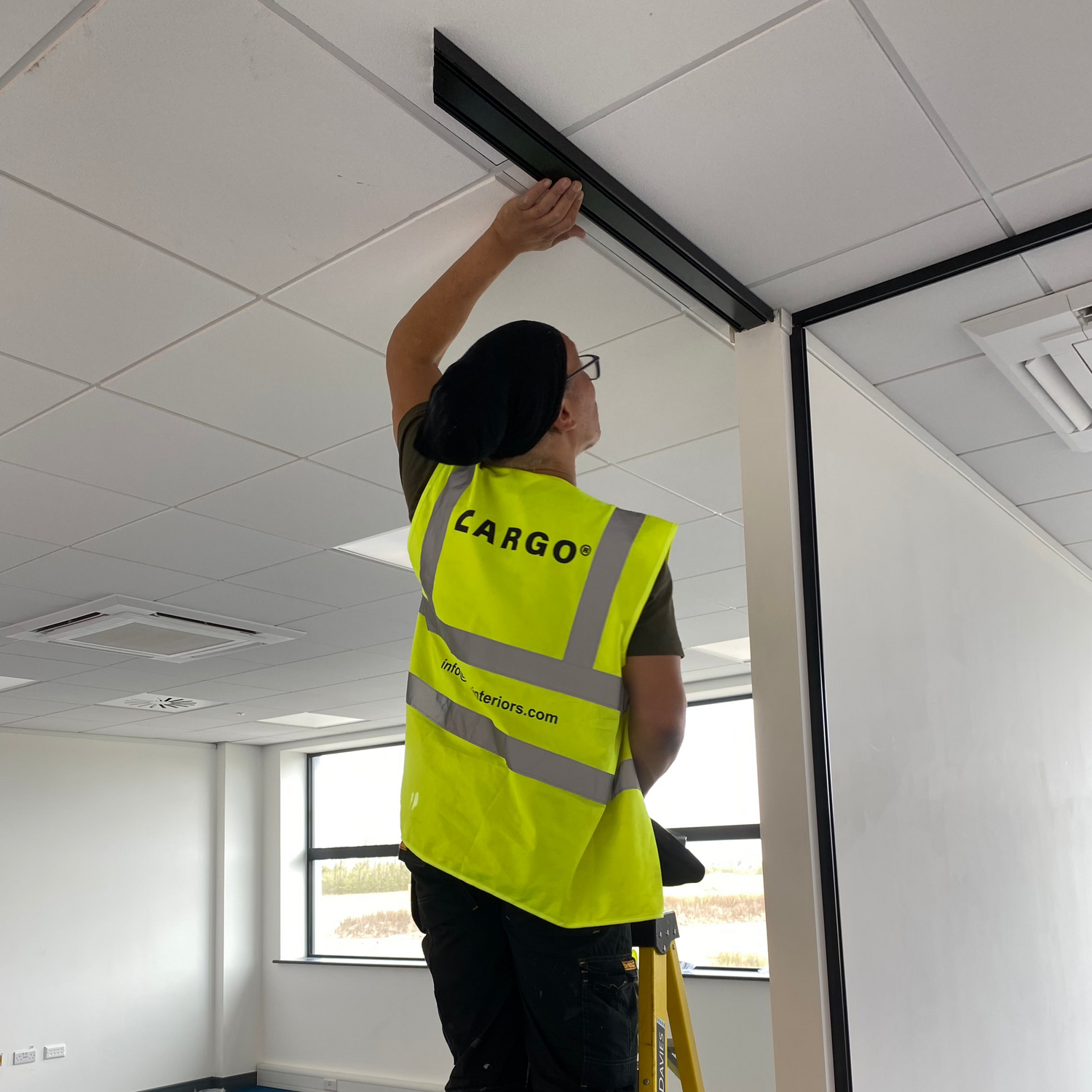 cargo office interiors fitting a glass partition